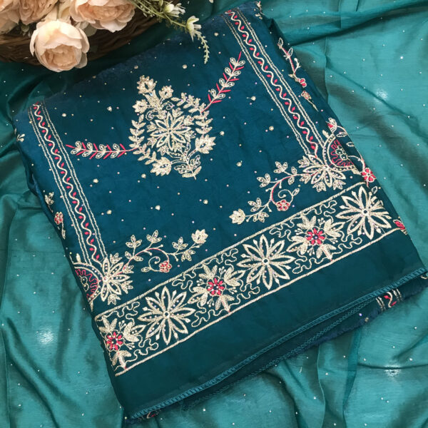 Home deep teal green crushed tissue silk suit with golden zari and thread work